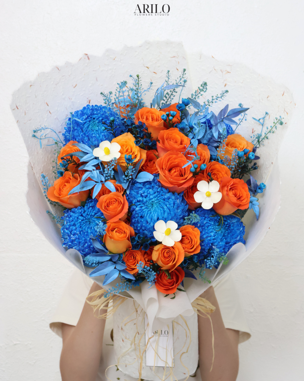 BÓ HOA MÀU CAM XANH NỔI BẬT MỘT LỜI CHÚC RỰC RỠ VÀ KHÁC BIỆT B310